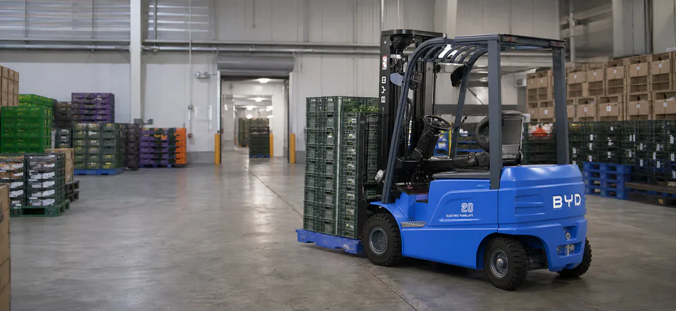 BYD lithium forklift moving produce crates in a northern Melbourne warehouse
